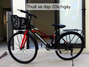 a bike parked in front of a building at Hang Camping 2 in An Ninh