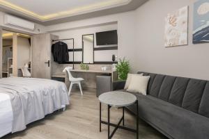 Postel nebo postele na pokoji v ubytování Callinica Hotel