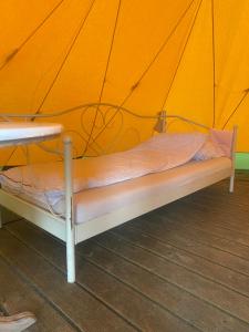 Postel nebo postele na pokoji v ubytování Jahbazaar Camping Jūrmala