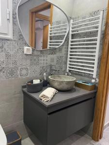 a bathroom with a sink and a mirror at Luxury 2 bedrooms apartment in kantaoui in Bin Rhilouf