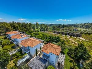 an overhead view of a house with orange roof at Sofia Maisonette by RentalsPro - Sani Halkidiki in Sani Beach +43 photos
