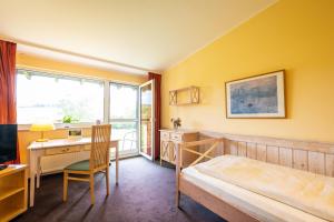 Postel nebo postele na pokoji v ubytování Menschels Vitalresort + 24 fotografií