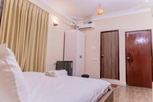 Postel nebo postele na pokoji v ubytování Casa Aqua Villa