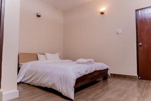 Postel nebo postele na pokoji v ubytování Casa Aqua Villa
