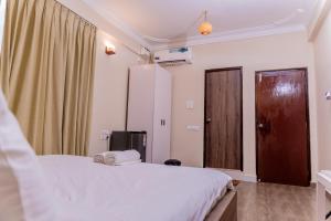 Postel nebo postele na pokoji v ubytování Casa Aqua Villa
