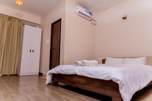 Postel nebo postele na pokoji v ubytování Casa Aqua Villa