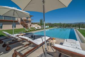 Πισίνα στο ή κοντά στο Luxury Marigold Cortona View I Comfort Sauna & Infinity Pool