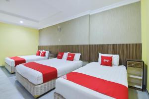 Postel nebo postele na pokoji v ubytování Hotel O Rayyan Soffea Managed by Oravel + 37 fotografií