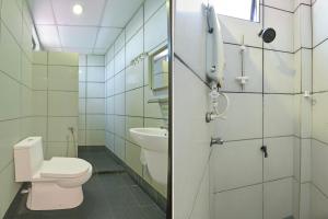 Koupelna v ubytování Hotel O Rayyan Soffea Managed by Oravel