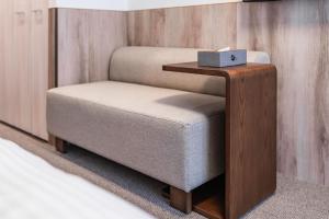 Łóżko lub łóżka w pokoju w obiekcie Apartment Hotel 11 Nagoya