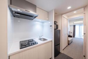 Kuchnia lub aneks kuchenny w obiekcie Apartment Hotel 11 Nagoya