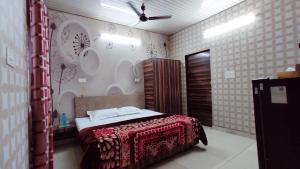 SYL HOTELS One - Comfortable and Secure Stays客房内的一张或多张床位