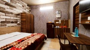 SYL HOTELS One - Comfortable and Secure Stays客房内的一张或多张床位