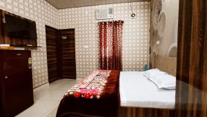 SYL HOTELS One - Comfortable and Secure Stays客房内的一张或多张床位