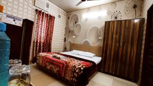 SYL HOTELS One - Comfortable and Secure Stays客房内的一张或多张床位