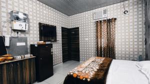 SYL HOTELS One - Comfortable and Secure Stays客房内的一张或多张床位