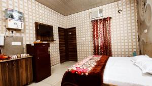 SYL HOTELS One - Comfortable and Secure Stays客房内的一张或多张床位