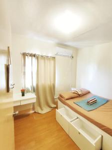 Кровать или кровати в номере SuiteStays - Pagadian Staycation +36 фотографий