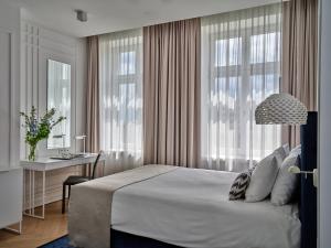 Posteľ alebo postele v izbe v ubytovaní Hotel Indigo Warsaw Nowy Świat by IHG