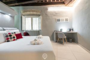 Postel nebo postele na pokoji v ubytování Amo Castle Rooms + 25 fotografií