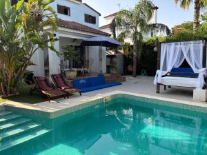 Bazén v ubytování Atuaire Home Sevilla nebo v jeho okolí