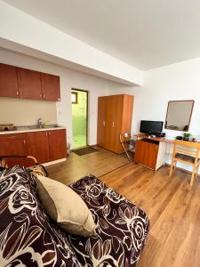 TV a/nebo společenská místnost v ubytování Family Hotel Helios