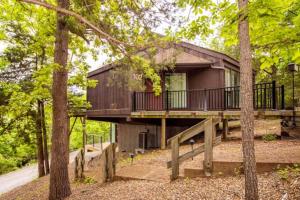 a tree house in the middle of the forest at Treetop Village-treetop Escape 102 in Four Seasons