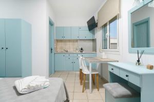 Η κουζίνα ή μικρή κουζίνα στο Green Apartments