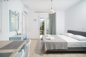 Ένα ή περισσότερα κρεβάτια σε δωμάτιο στο Green Apartments