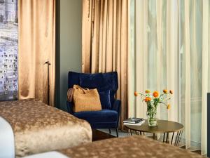 Posteľ alebo postele v izbe v ubytovaní Hotel Indigo Warsaw Nowy Świat by IHG