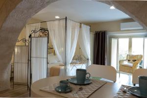 Χώρος καθιστικού στο Ortigia Stone's Loft Spa