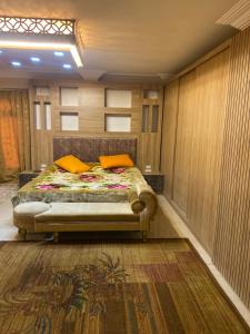 Postel nebo postele na pokoji v ubytování Hassan home