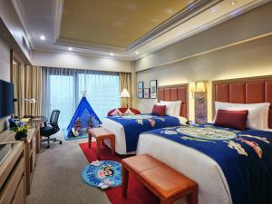 Ένα ή περισσότερα κρεβάτια σε δωμάτιο στο InterContinental Shenzhen by IHG