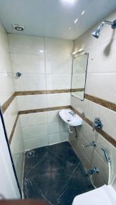 Koupelna v ubytování Palm Breeze Hotel - Colaba