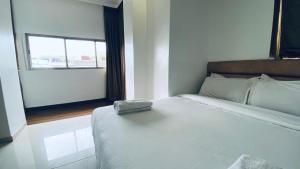 Postel nebo postele na pokoji v ubytování Palm Breeze Hotel - Colaba