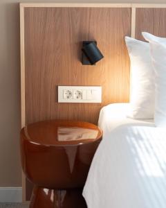 Postel nebo postele na pokoji v ubytování Hotel Admiral Vinkovci