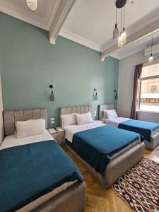 Postel nebo postele na pokoji v ubytování Cheers Hostel Cairo