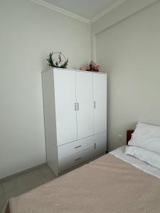 Ein Bett oder Betten in einem Zimmer der Unterkunft A nest for two in Athens