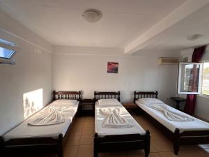 Postel nebo postele na pokoji v ubytování Casa Bucuria Henri Coanda