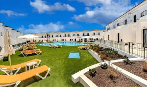 an image of the courtyard of a hotel at Checkin Ocean Tenerife in San Miguel de Abona