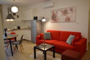 Kuchyň nebo kuchyňský kout v ubytování Sunny Day apartments