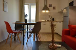 Kuchyň nebo kuchyňský kout v ubytování Sunny Day apartments