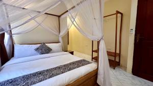 Postel nebo postele na pokoji v ubytování Ultra Home Hostel