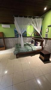 Posezení v ubytování Putu Guest House Pemuteran