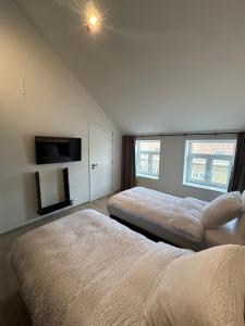 Tempat tidur dalam kamar di Manteka Logies