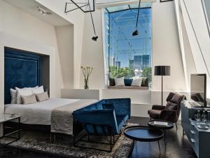 Posteľ alebo postele v izbe v ubytovaní Hotel Indigo Warsaw Nowy Świat by IHG