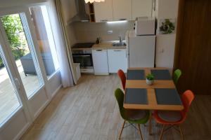 Kuchyň nebo kuchyňský kout v ubytování Sunny Day apartments