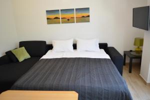 Postel nebo postele na pokoji v ubytování Sunny Day apartments