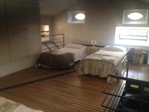Posteľ alebo postele v izbe v ubytovaní Romeo and Juliet Apartaments