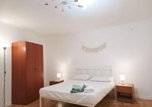 Postel nebo postele na pokoji v ubytování Astra Solea